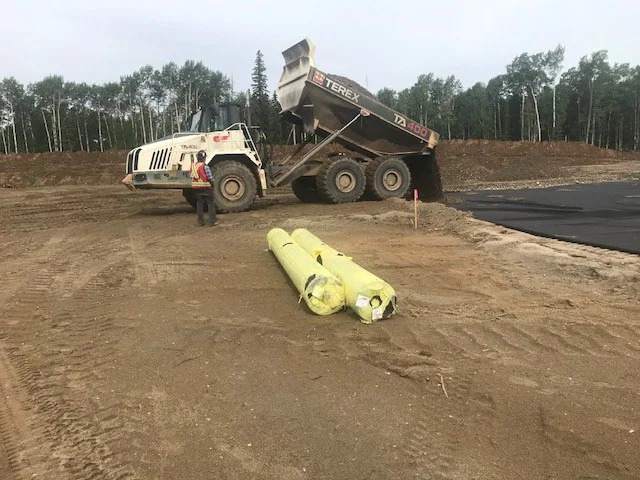 Rock dumping to spread cat ring road